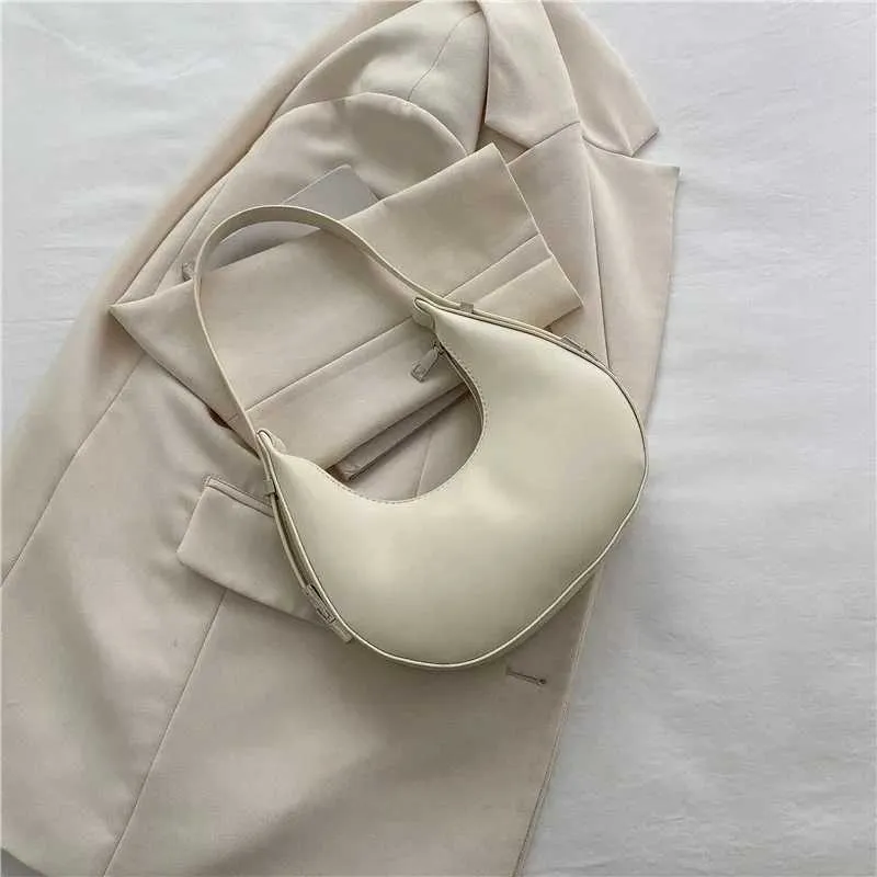 Borsa a spalla a mezzaluna donna elegante in ecopelle_voghion.com