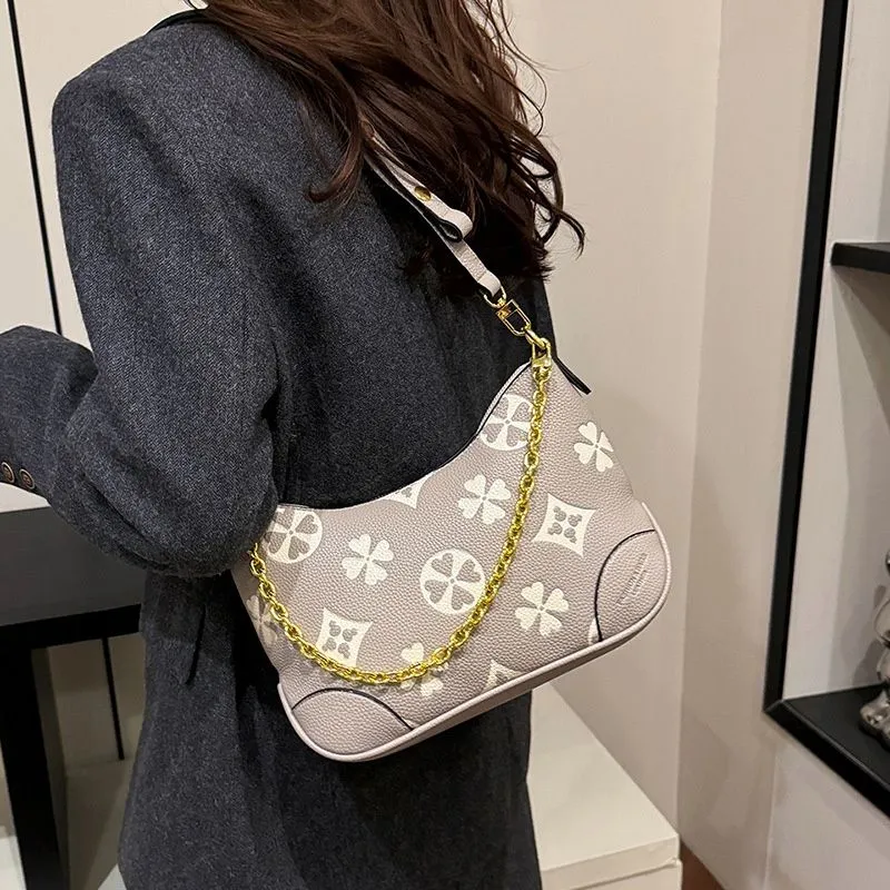 Free Shipping 2025 Designer Fashionable Commuting Dumpling Armpit Chain Carrying Shoulder Bag For Women_voghion.com