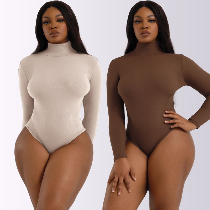 Tuta a maniche lunghe con collo alto e fondo a camicia da donna autunno e inverno_voghion.com