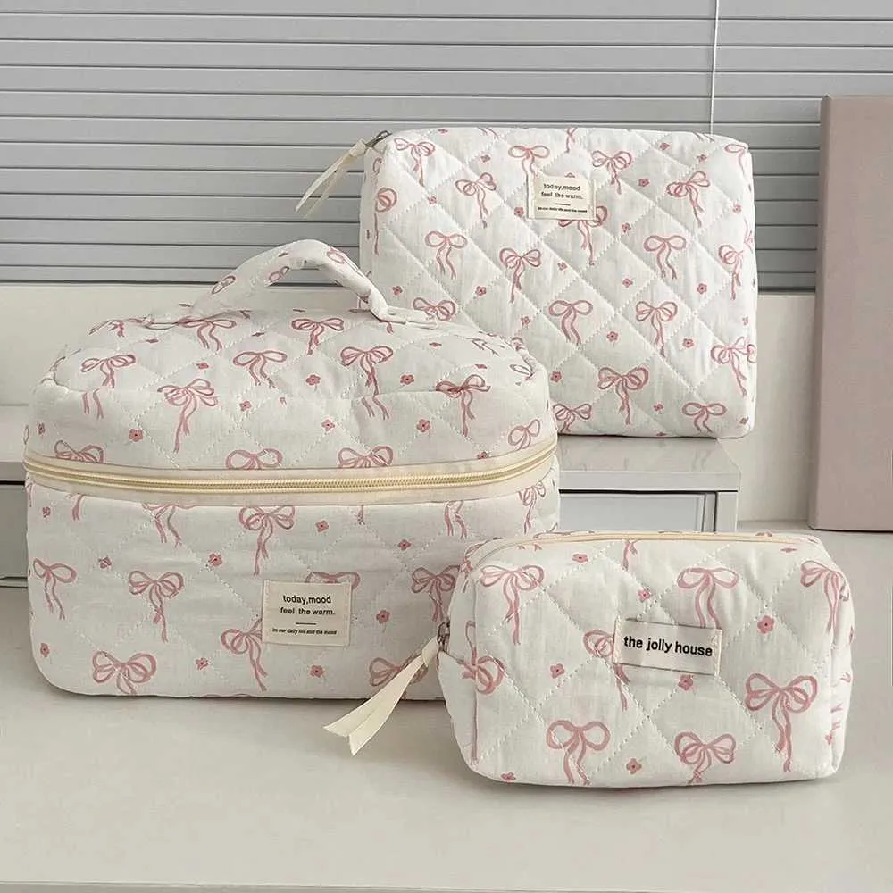 Neue Mode Bogen Frauen Gesteppte Make-Up Tragbare Kosmetik Wc Lagerung Handtasche wer Baumwolle Reißverschluss Tasche Y241023_voghion.com