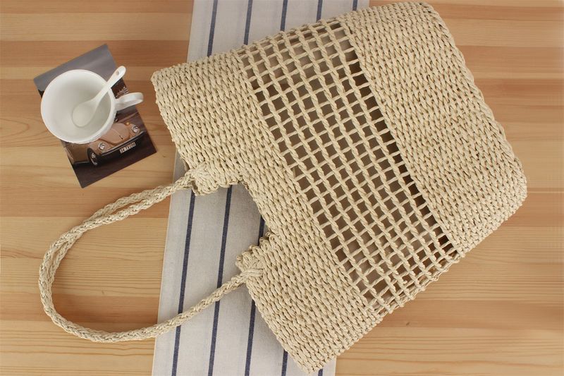 Gewebte Tasche aus Papierseil, neue französische Nischen-Hohlgewebetasche, eine Schulter, handgehaltene Strandtasche mit_voghion.com