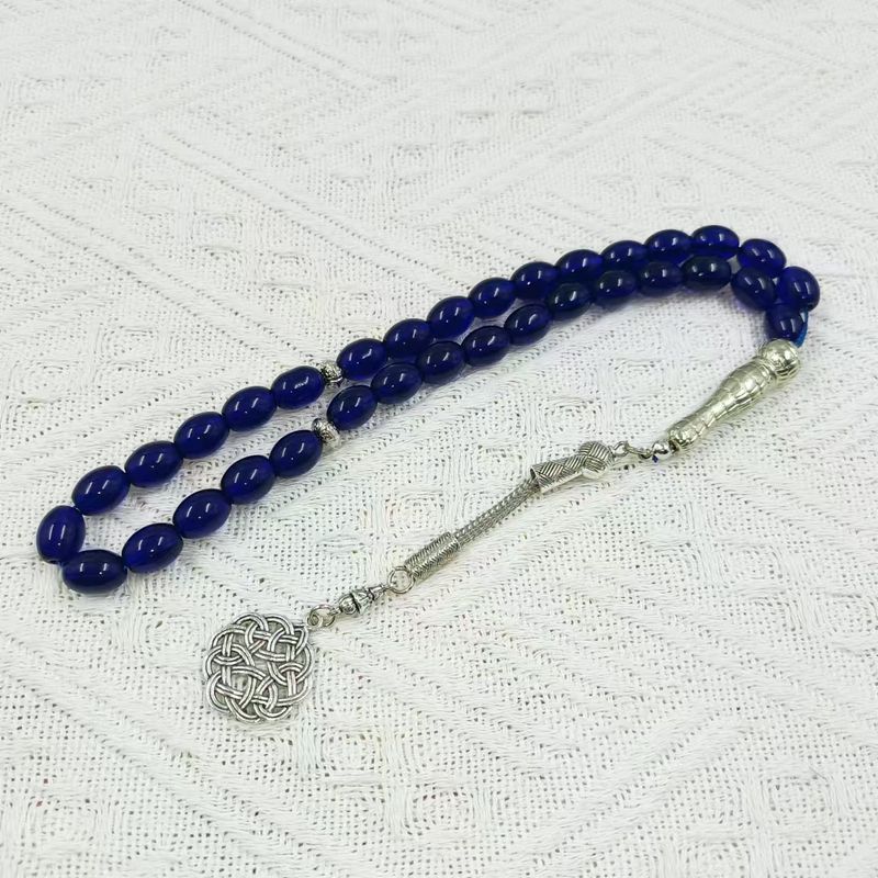 Braccialetto rosario unisex con 33 perle di riso e 8 cristalli_voghion.com