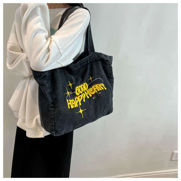 New Large Capacity Cowboy Shoulder Student's Canvas Schoolbag Women's Shopping Bag Street Dressing_voghion.com