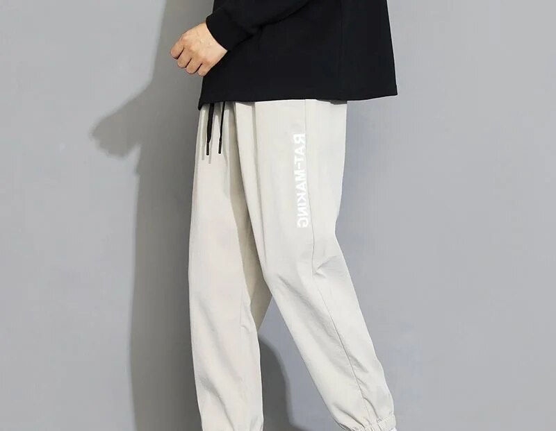 Ice Silk Pants for Men's Summer Thin, Loose, Trendy, Sports Versatile, Elastic, Quick Drying, Ultra Thin, 9-inch Casual Pants_voghion.com