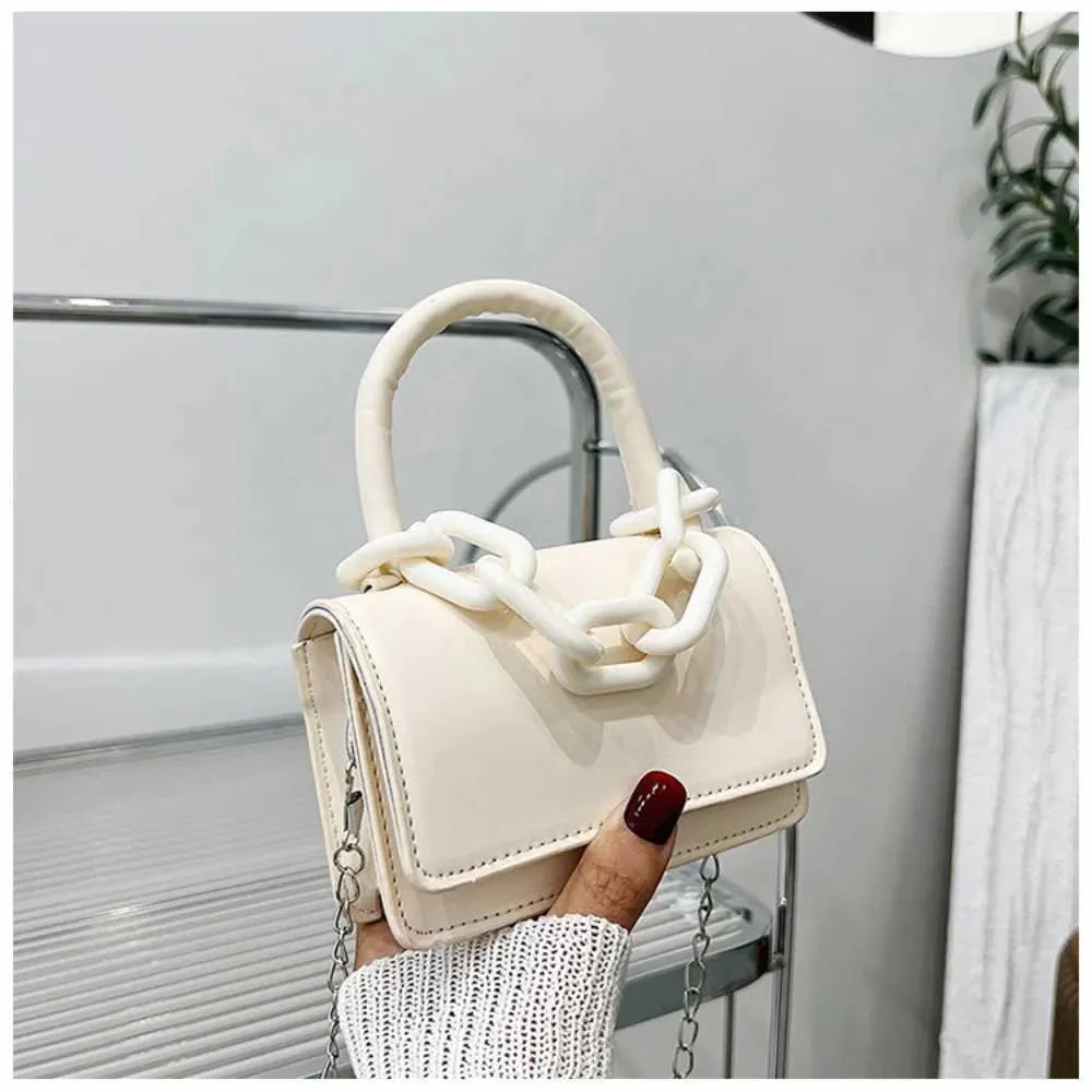 Designer 2024 Femmes Horizontal Édition Coréenne Chaîne Petit Carré Mode Mini Sac À Bandoulière Flip Boucle Sac À Main Portefeuille_voghion.com