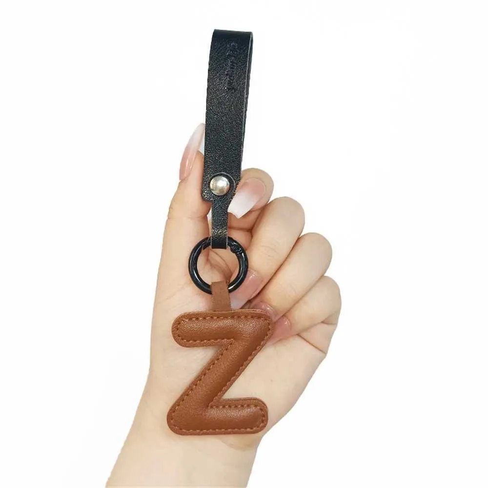 Creative leather English letter keychain pendant decoration phone bag accessories gift Y241121_voghion.com