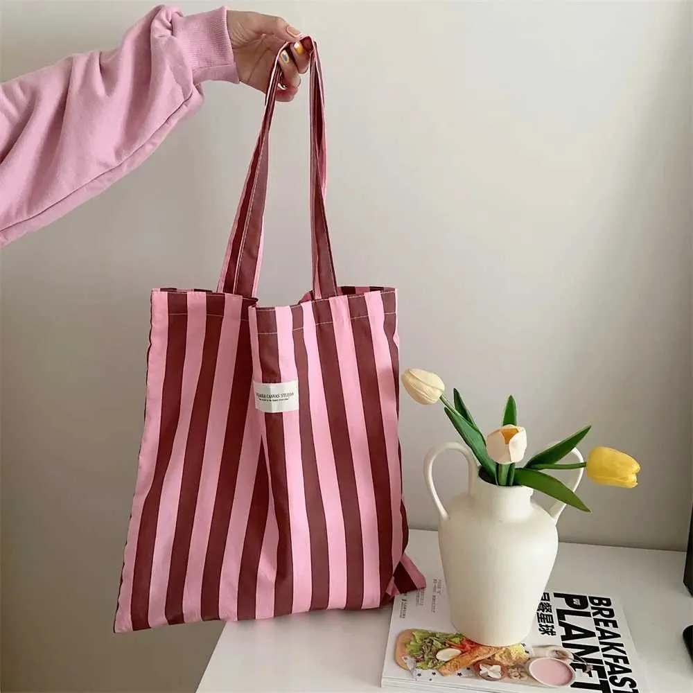 Vintage gestreifte warme Leinwand große Kapazität tägliche Einkaufstasche lässig tragbare Damen Reisehandtasche Y241109_voghion.com