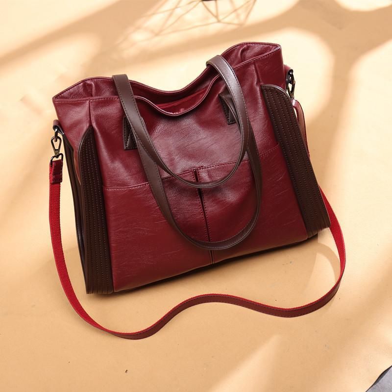 Net rot gleiche Stil Canvas Kapazität einzelne Schulter große Tasche Frauen 2024 neue trendige Handtasche einfache_voghion.com