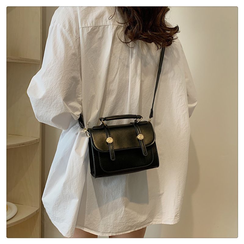 Britische Schulter für Frauen 2024 Neue trendige Studentin Multifunktionaler Rucksack Handheld Reisetasche_voghion.com