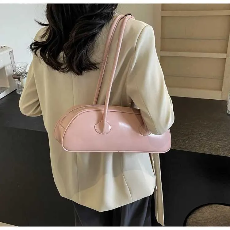 Sac à aisselles en bâton français de grande capacité, version coréenne, tendance féminine, Xiaohongshu, même style, bandoulière simple, porté à la main_voghion.com