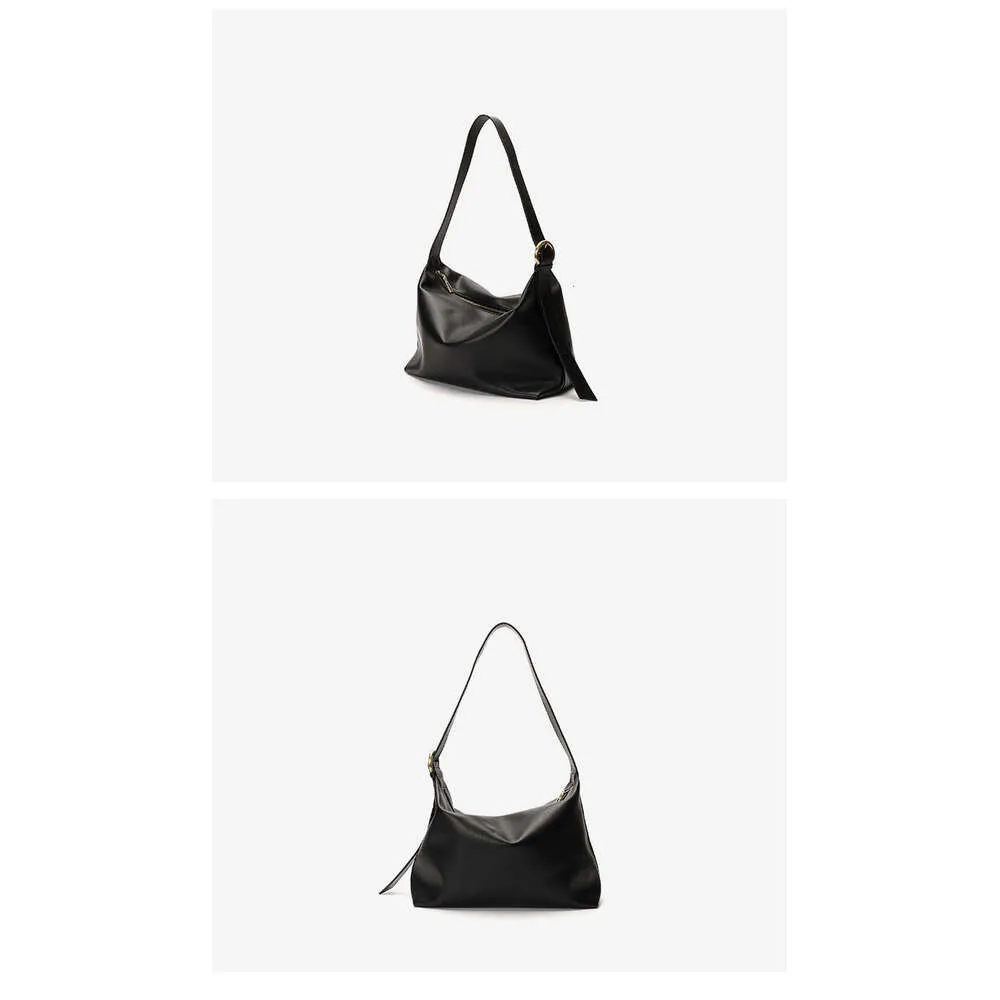 Same Style As Blogger One Shoulder Armpit Simple And Versatile High-Capacity Temperament Fashion Niche Cowhide Women Bag_voghion.com