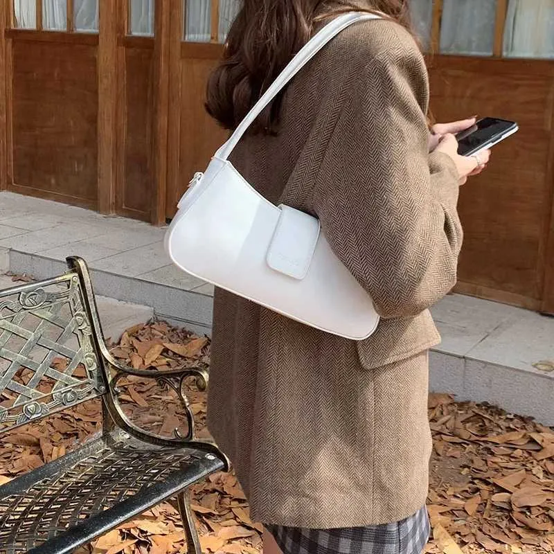 Fashion Shoulder Axillary Solid Color Niche Black Small Square Bag Leisure Versatile Lady Commuter Bags Crossbody_voghion.com