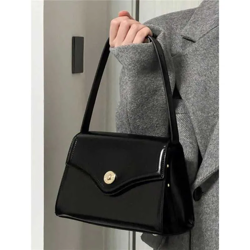 Black PU Leather Single Shoulder 2023 New Womens Buckle High Capacity Underarm Bag Designer Advanced Texture Ladies_voghion.com