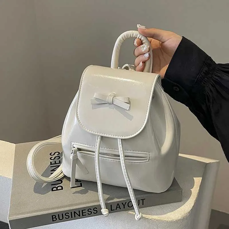 Mochila feminina sólida com aba e laços, mini bolsas de ombro, versátil, feminina, grande capacidade, bolsas de couro, casual, estudante_voghion.com