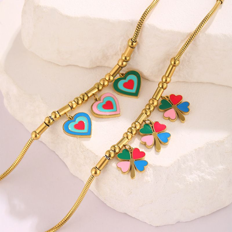 Bracciale personalizzato in acciaio inossidabile placcato oro con ciondolo a forma di quadrifoglio Dripping Love_voghion.com