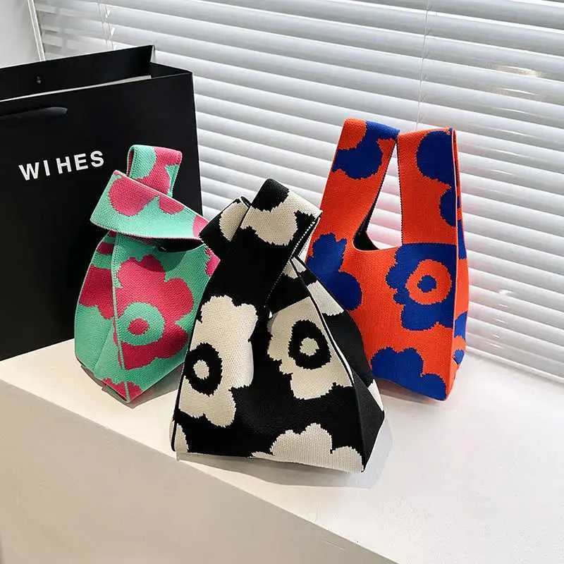 Borsa a mano in tela artistica giapponese di grande capacità, modello Geely, portafoglio con nodo casual e borsa da polso alla moda e versatile Wens_voghion.com