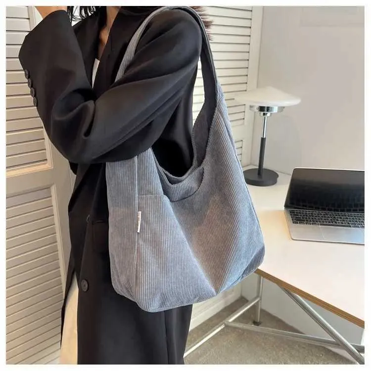 Canvas Shoe Corduroy è una borsa da designer semplice e casual di grande capacità progettata per la borsa da viaggio solida Wens_voghion.com