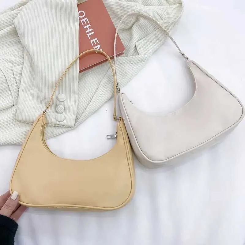 Wens Nyl Shoe 2023 Fi Solid Canvas Dumpg Unterarm Designer Tasche Cluh Geldbörse und Handtasche Y241026_voghion.com
