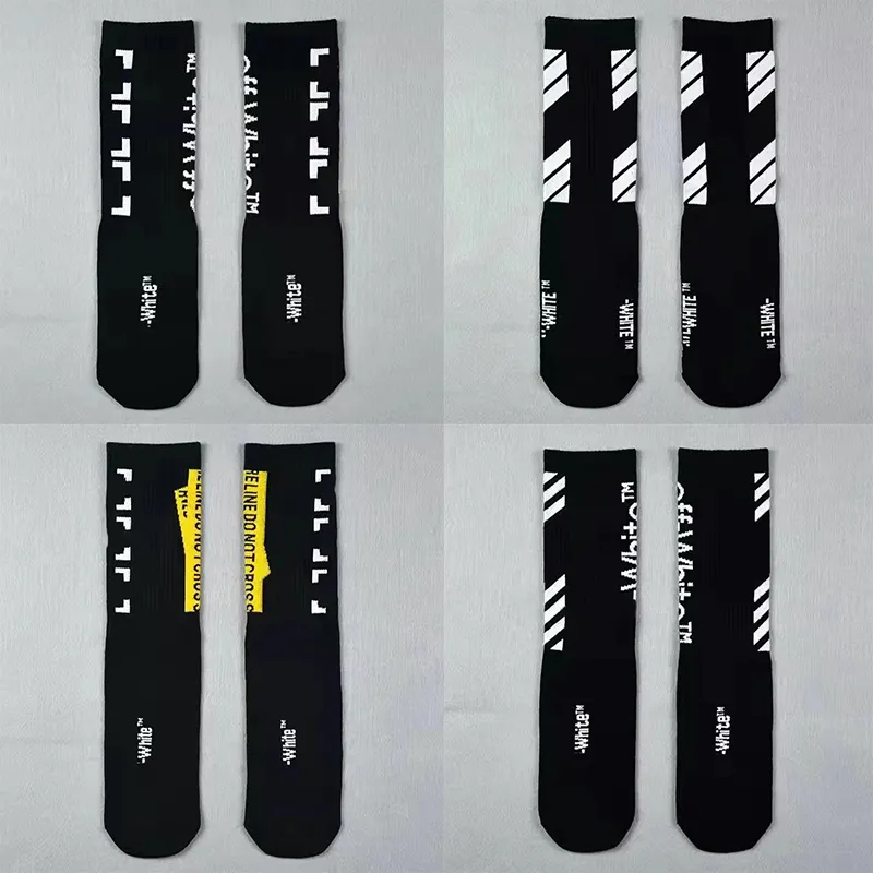 Men's socks Fashion designer Street wear Men's high quality all cotton matched arrow print Breathable black and white rice football socks_voghion.com