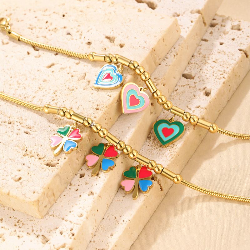 Bracciale personalizzato in acciaio inossidabile placcato oro con ciondolo a forma di quadrifoglio Dripping Love_voghion.com