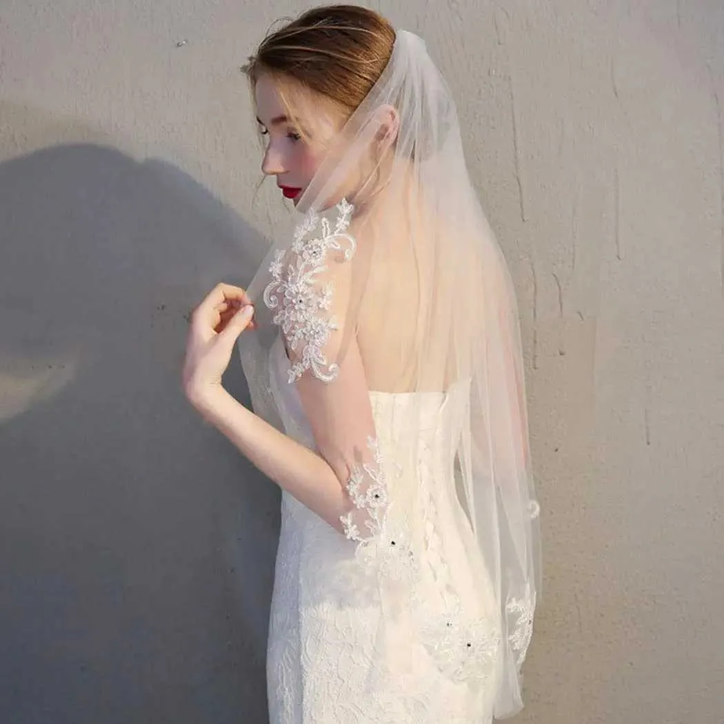 Velo da sposa in tulle con applicazioni in pizzo e cristalli, a 1 strato, corto, lungo fino ai fianchi, accessorio per capelli_voghion.com