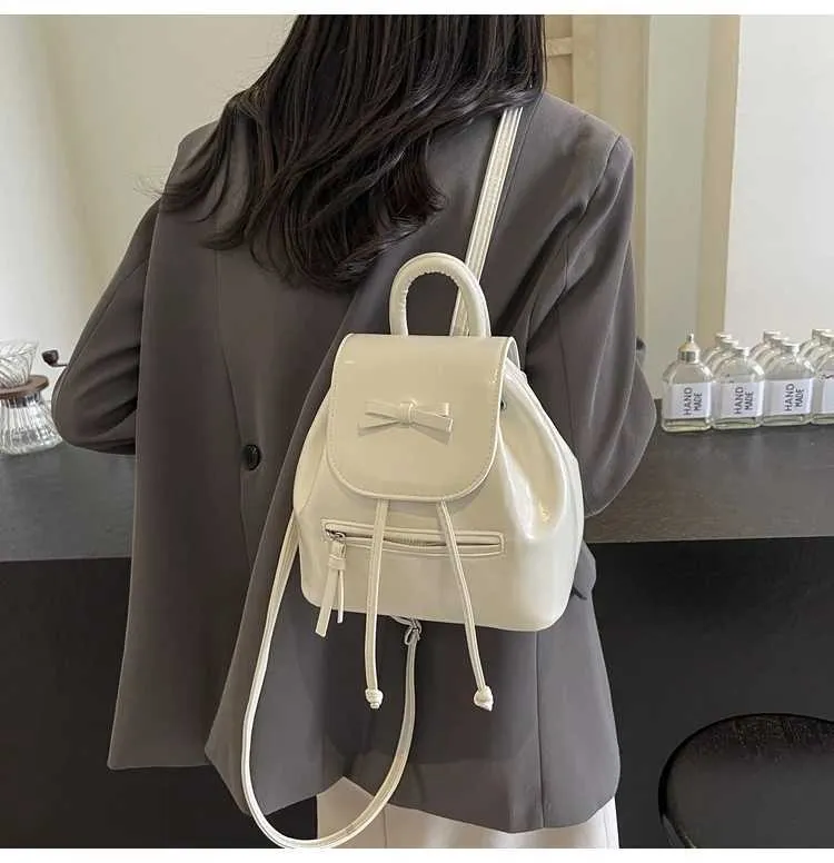 Mochila feminina sólida com aba e laços, mini bolsas de ombro, versátil, feminina, grande capacidade, bolsas de couro, casual, estudante_voghion.com
