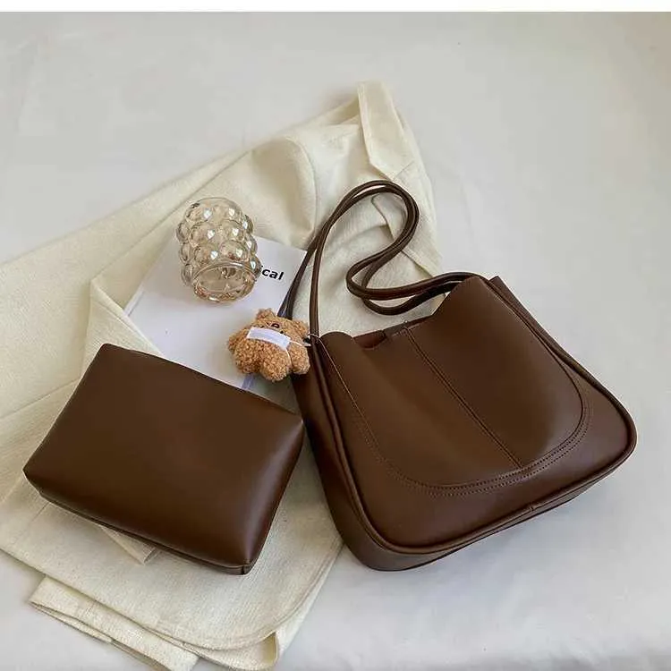 Bolso de hombro de alta gama con textura de gran capacidad, nuevo bolso de mano para mujer, otoño e invierno 2024, C241106_voghion.com