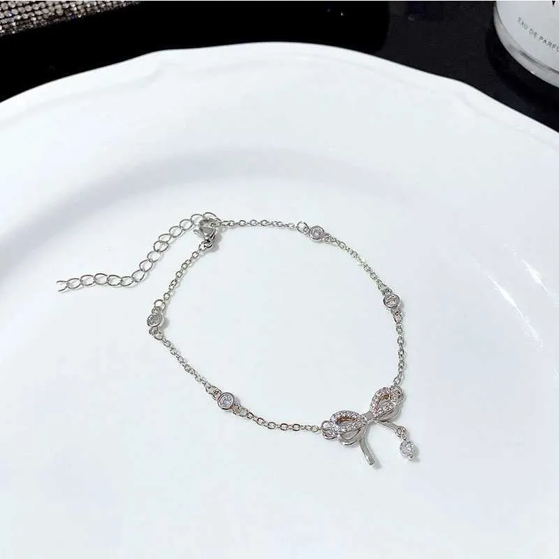 Bracciale regolabile con fiocco in strass per donna gioiello_voghion.com