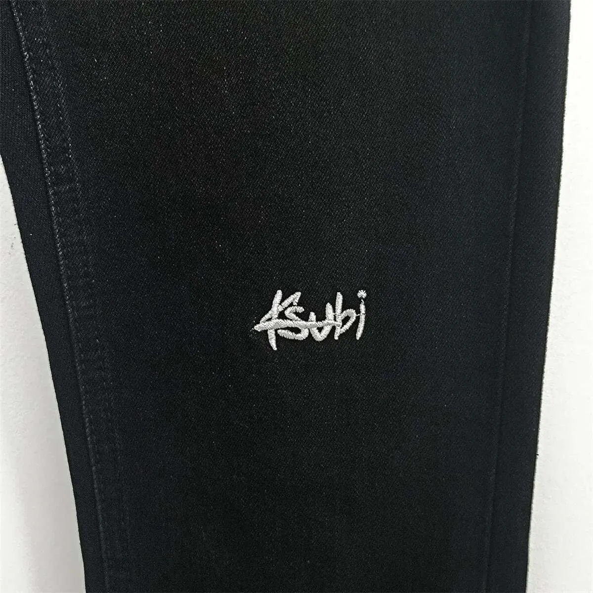 KSUBI Cross Men Fashion American High Street Black Casual Letter Embroidery Pants Stretch Skinny Ripped Frayed Jeans_voghion.com
