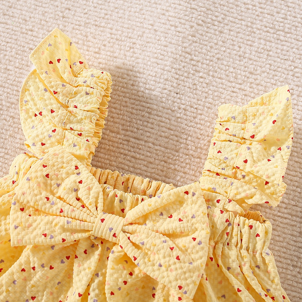 Peutermeisjes kinderkledingset van katoen, klein hartje, bedrukt, geel/roze strik, top en short_voghion.com