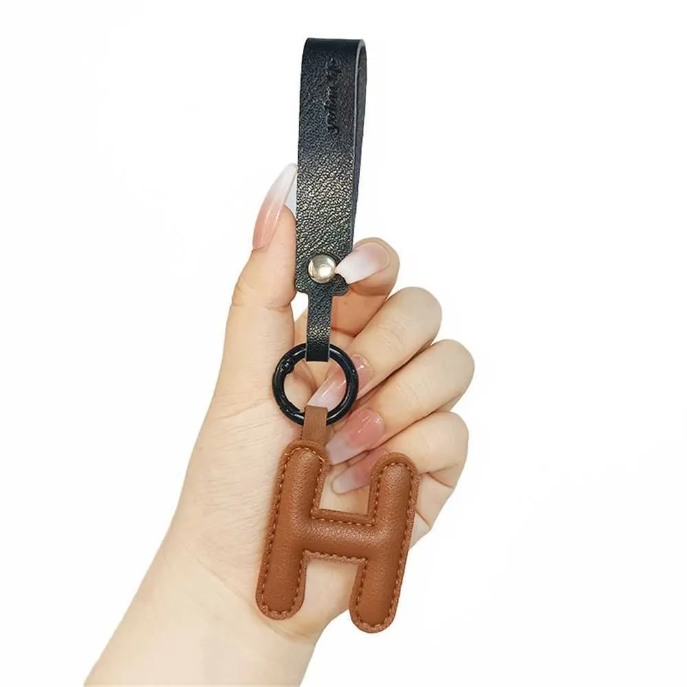 Creative leather English letter keychain pendant decoration phone bag accessories gift Y241121_voghion.com