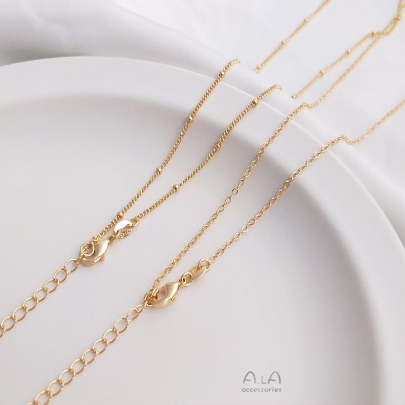 Catena di estensione a goccia d'acqua con perlina piatta O in acciaio JF14K con finitura in oro vero, colore preservato, clavicola da 45 cm_voghion.com