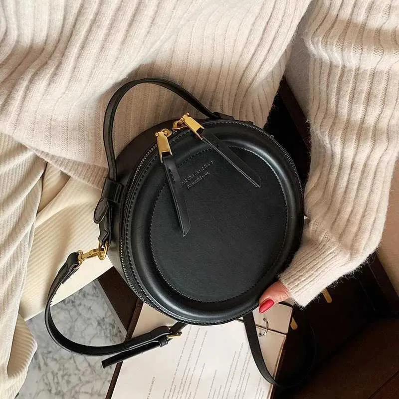 Sac à bandoulière de couleur unie pour petit sac à main rond pour femmes, sacs de créateurs de mode, sac à bandoulière en cuir, fermeture éclair pour femmes_voghion.com