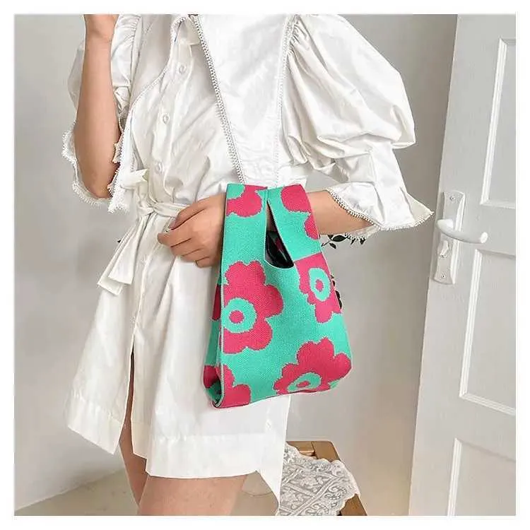 Borsa a mano in tela artistica giapponese di grande capacità, modello Geely, portafoglio con nodo casual e borsa da polso alla moda e versatile Wens_voghion.com