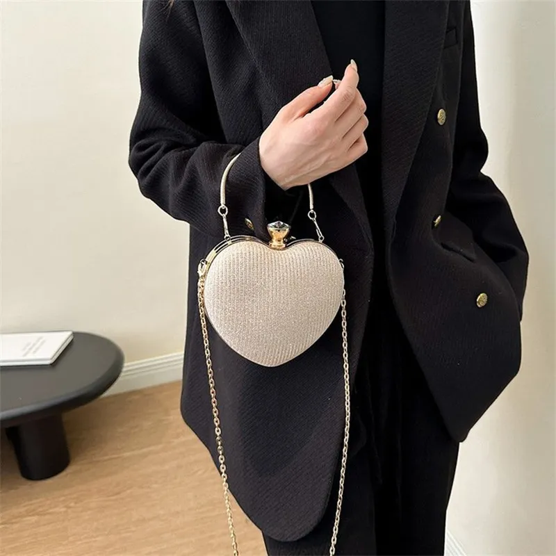 Pochette da sera Borsa da donna lucida Pochette in metallo a forma di cuore Borsa a tracolla con catena di moda Borsa da donna_voghion.com