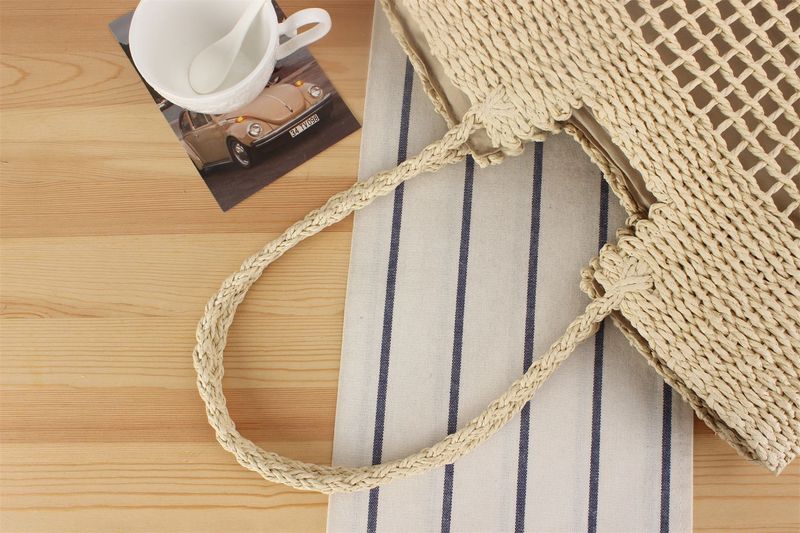 Gewebte Tasche aus Papierseil, neue französische Nischen-Hohlgewebetasche, eine Schulter, handgehaltene Strandtasche mit_voghion.com