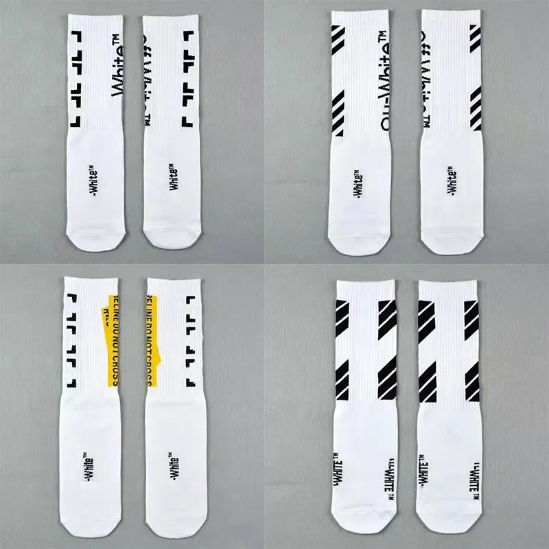 Men's socks Fashion designer Street wear Men's high quality all cotton matched arrow print Breathable black and white rice football socks_voghion.com