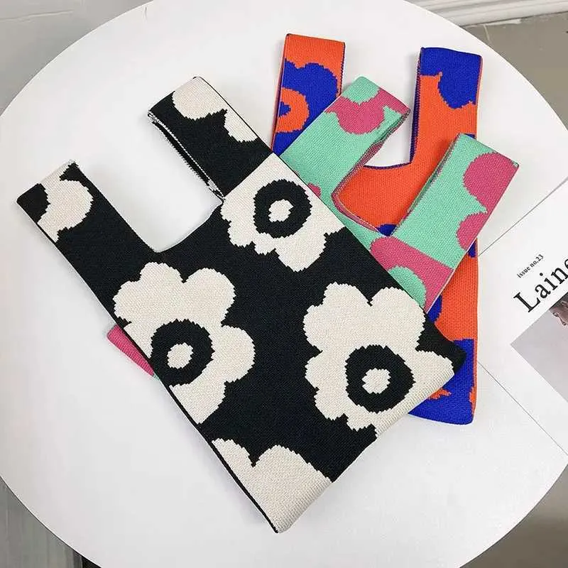 Borsa a mano in tela artistica giapponese di grande capacità, modello Geely, portafoglio con nodo casual e borsa da polso alla moda e versatile Wens_voghion.com