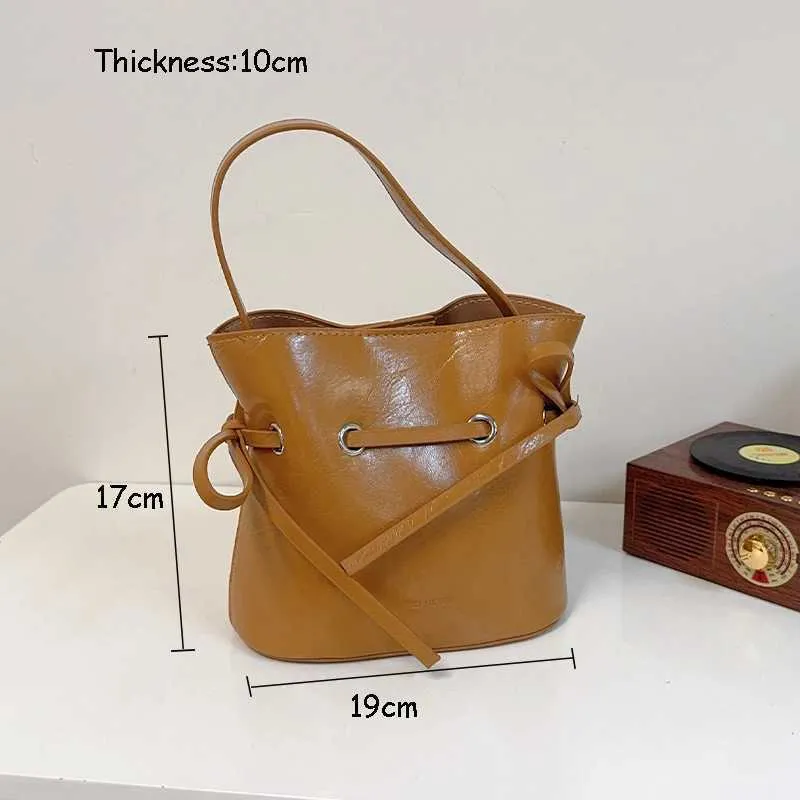 Borsa a secchiello vintage in ecopelle con fiocco borsa a tracolla_voghion.com