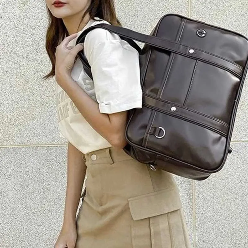 Stilvolle schwarze Schultasche für japanische Schüler, Handtasche, die jugendliche Energie widerspiegelt und C241104_voghion.com