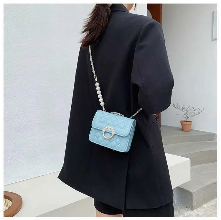 Borsa a spalla e tracolla elegante da donna con catena di perle_voghion.com
