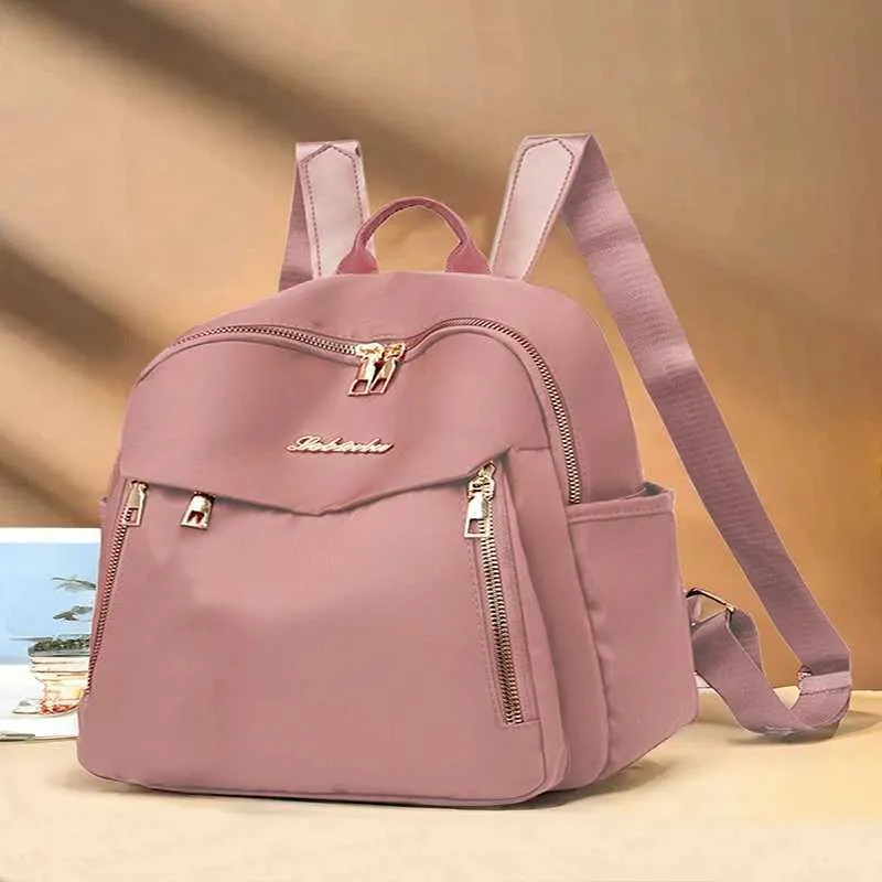 Mochila de mujer impermeable en nylon bolso versátil de moda_voghion.com