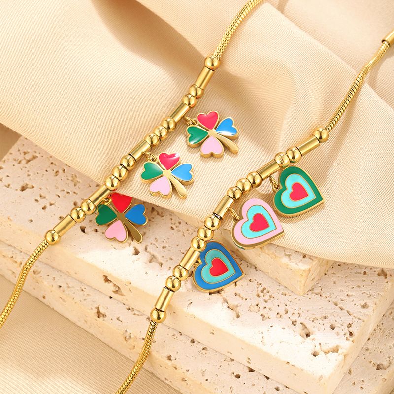 Bracciale personalizzato in acciaio inossidabile placcato oro con ciondolo a forma di quadrifoglio Dripping Love_voghion.com