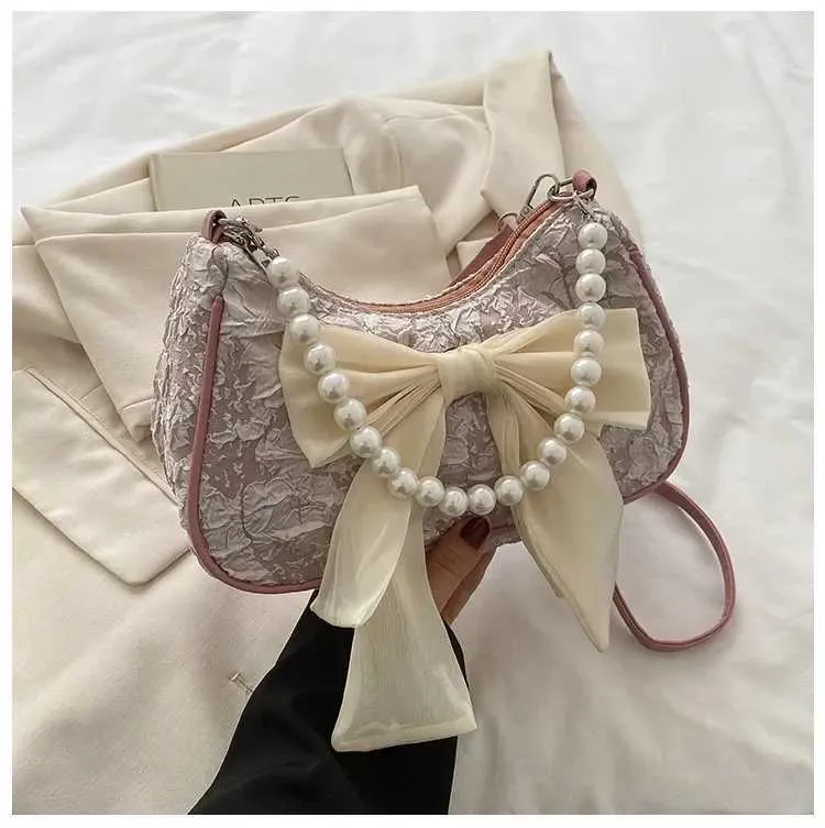 Sommer Neue Frauen Perle Handtasche Modische Trendy Bowknot Plissee Weibliche Umhängetaschen Nette Vielseitige Einzelne Schulter_voghion.com