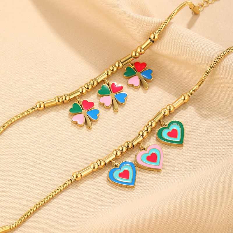 Bracciale personalizzato in acciaio inossidabile placcato oro con ciondolo a forma di quadrifoglio Dripping Love_voghion.com