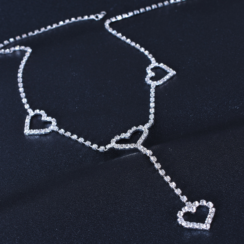 Accessorio di moda bikini creativo decorazione di strass personalità del corpo cuore di pesca cintura a catena in vita geometrica_voghion.com