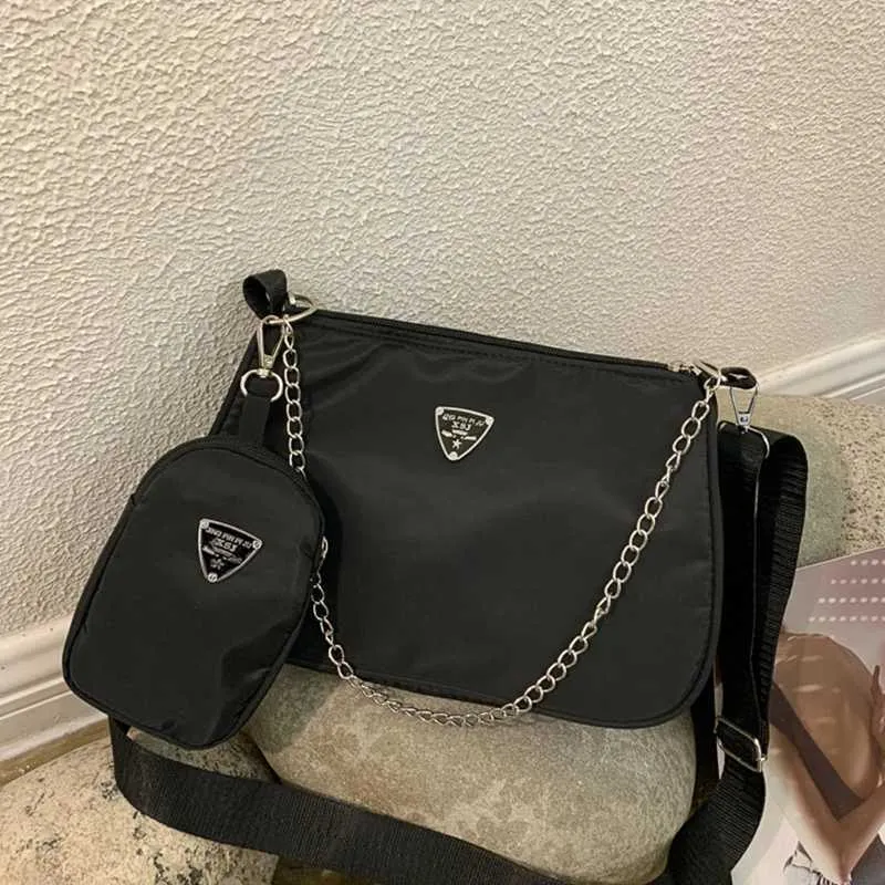 Borsa a mano elegante da donna con stampa pitone e tracolla_voghion.com
