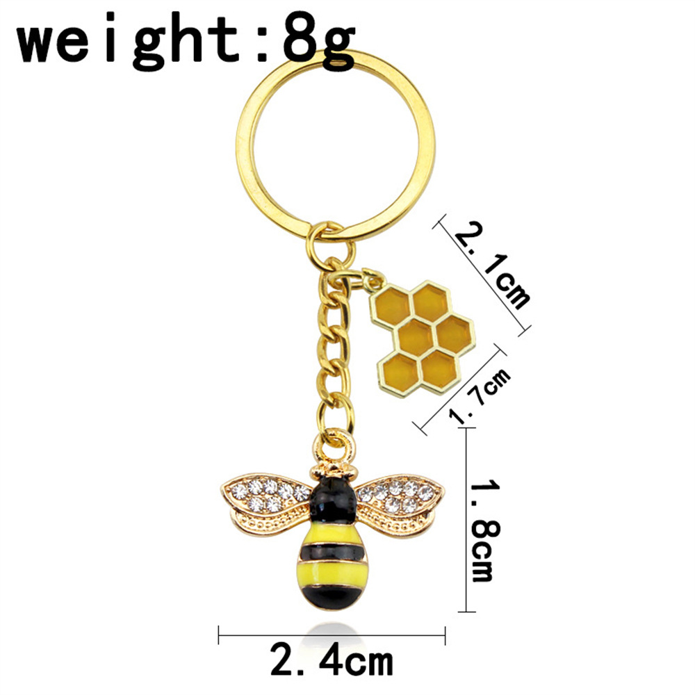 Llavero con forma de abeja y diamantes de imitación en forma de panal hexagonal para mujer_voghion.com