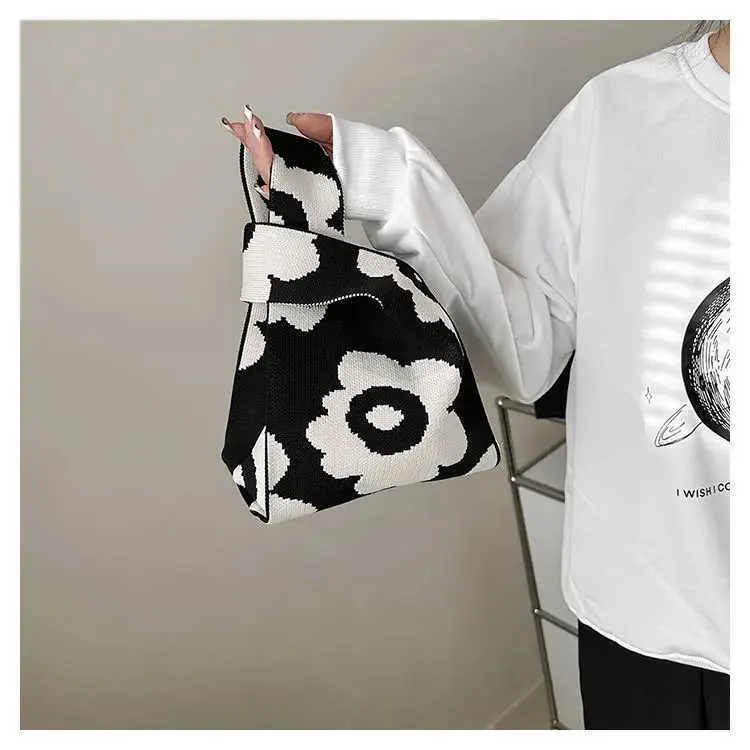 Borsa a mano in tela artistica giapponese di grande capacità, modello Geely, portafoglio con nodo casual e borsa da polso alla moda e versatile Wens_voghion.com
