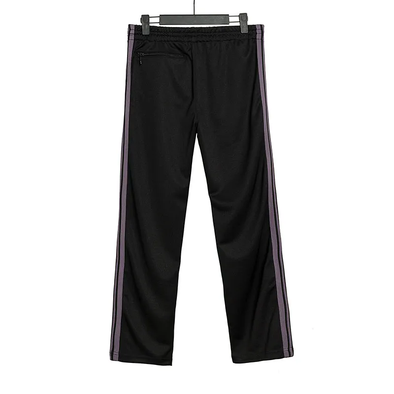 Mäns Needles-spår Fritidsbyxor Streetwear AWGE Träningsbyxor Kvinnor Herr Randig Dragkedja Byxa Butterfly Broderi Joggers Needles_voghion.com